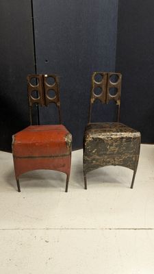 three chairs are sitting next to each other on a white floor