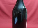 a bottle of wine that is sitting on a table
