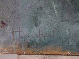 a painting on the wall of a building with writing on it
