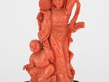 Figurine chinoise en corail sculpté représentant une femme et un enfant