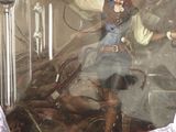 a figurine of a woman dressed in a pirate costume