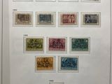 a framed picture of a collection of stamps from the netherlands