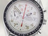 a close up of a wrist watch with a white dial