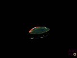 an image of a leaf floating in the dark water