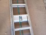 the ladder is leaning up against the wall in the garage