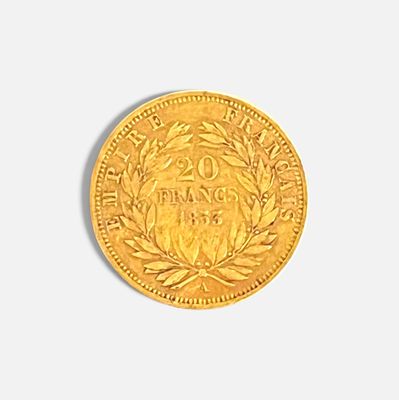 une image d'une pièce d'or sur une surface blanche