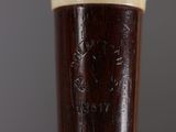 a close up of a baseball bat with a wooden handle
