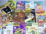 a lot of comic books on the table