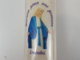 a candle that has a picture of a woman on it