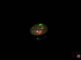 an image of a glowing object in the dark