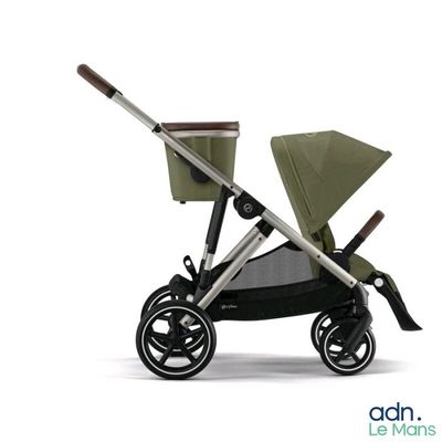 an image of a baby stroller with a baby carriage attached to it