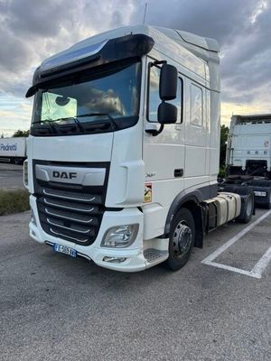 a white truck that is parked in a parking lot