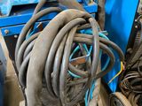 an image of a blue machine in a garage