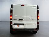 a white van that is parked in a room