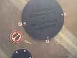 an overhead view of a gas tank with a no smoking sign on it