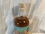 a bottle of rum that is sitting on a table