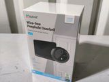a box that has a remote in it on a table