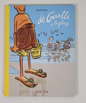 un livre sur lequel figure la photo d'une personne debout sur la plage