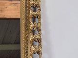 a mirror hanging on the wall in a room