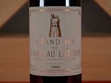 a bottle of wine that is sitting on a table