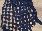 navy blue crocheted scarf with holes and fringes