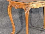 an image of a table with a glass top on a grey background
