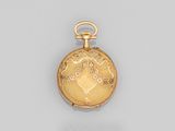 an image of a gold pocket watch with a chain on a white surface