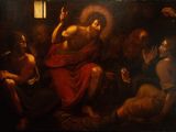 On voit, au milieu d'une pièce, l'image d'un tableau représentant Jésus.