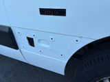 a white van with a sticker on the side of it