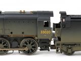 a toy train that is sitting on a white surface