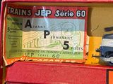 a toy train set in a box on a table