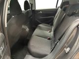 the interior of a car with the front seats folded down