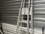 a ladder that is leaning against a wall in a garage