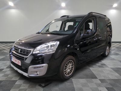 the black van is parked on a checkered floor in a room