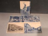 trois vieilles cartes postales représentant une ville surmontée d'une statue