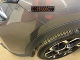 a close up of a car with a sticker on it