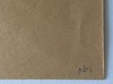 a brown piece of paper with writing on it