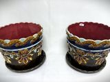two cups that are sitting on top of each other