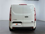 a white van that is parked in a room