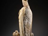 an image of a statue of a woman with a bird on her shoulder