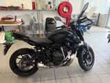 a motorcycle that is parked in a showroom