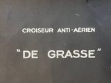 a picture of a sign on a wall that says de grasse