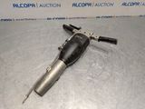 a close up of a small air tool on a table