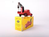 a red toy truck with a crane on top of it