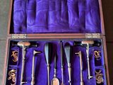 a purple case with a set of tools in it