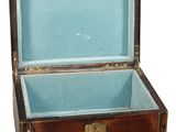 a wooden box with a blue lining inside of it