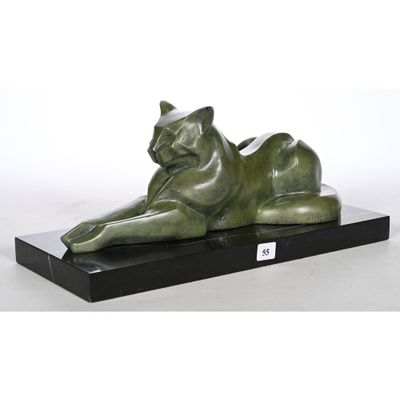sculpture of a cat on a black base on a white background