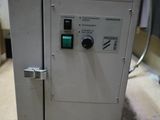 a machine that is sitting on the floor in a room