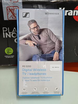 a box with a picture of a man sitting on a couch