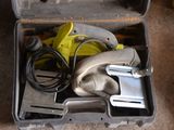 a tool box with tools in it sitting on the floor